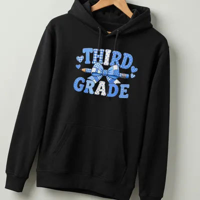 Patchwork design featuring 'THIRD GRADE', a blue bow, and a pencil. — printed on a unisex hoodie