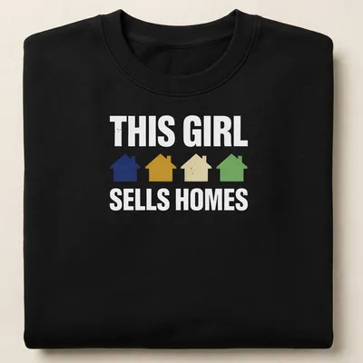 Retro t-shirt with houses and playful text saying 'This Girl Sells Homes' in cheerful colors — printed on a unisex sweatshirt