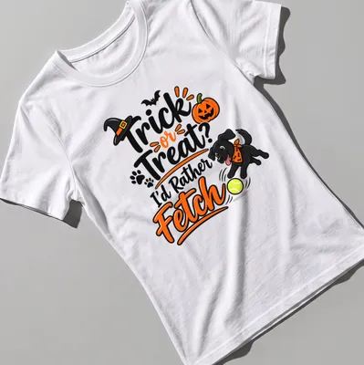 Playful cartoon t-shirt featuring black dog and Halloween text — printed on a women's shirt