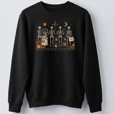 Whimsical illustration of skeletons with ultrasound equipment and text — printed on a unisex sweatshirt