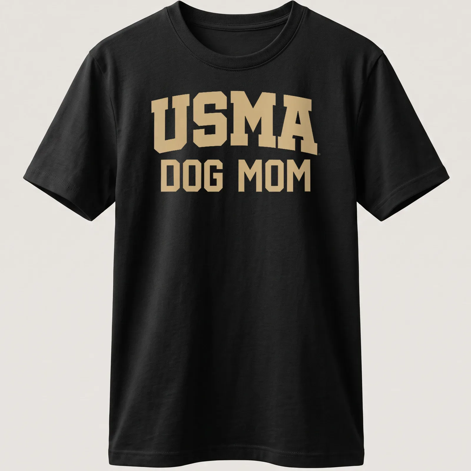 Bold USMA Dog Mom text in collegiate style with gold and white colors — printed on a unisex t-shirt