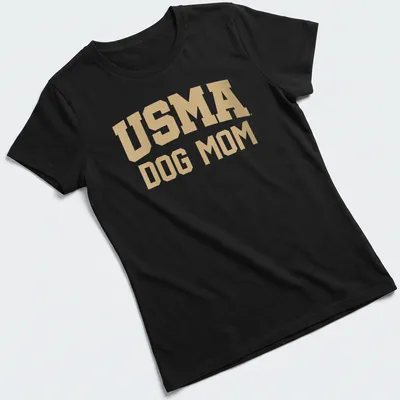 Bold USMA Dog Mom text in collegiate style with gold and white colors — printed on a women's shirt