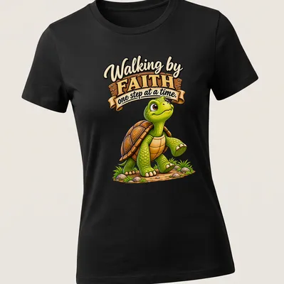 Cartoon turtle with text 'Walking by FAITH one step at a time.' in green and brown — printed on a women's shirt