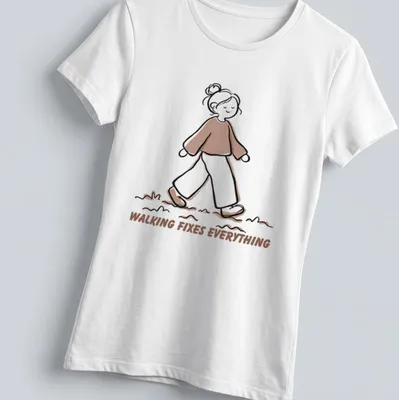 Cute walking girl line-art t-shirt with text 'Walking Fixes Everything' in brown and beige — printed on a women's shirt
