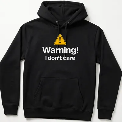 Warning sign graphic tee featuring bold text in yellow, black, and white — printed on a unisex hoodie