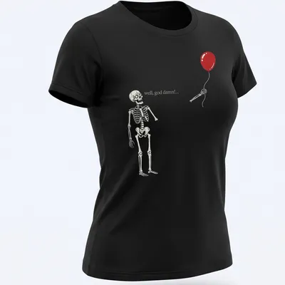 Humorous illustration of a skeleton holding a red balloon with quirky text — printed on a women's shirt
