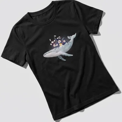 Watercolor design of a whale near a cottage garden in blue, white, yellow, purple, and pink — printed on a women's shirt